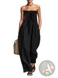 Black strapless smocked jumpsuit with gathered waist and wide-leg design for casual wear