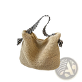 Beige woven straw tote bag with black and white striped fabric handles tied into bows for casual use
