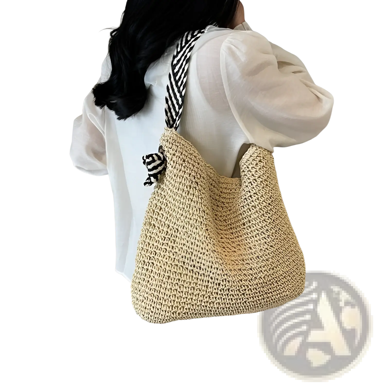 Beige woven straw tote bag with black and white striped shoulder strap and striped bow handles for stylish carrying