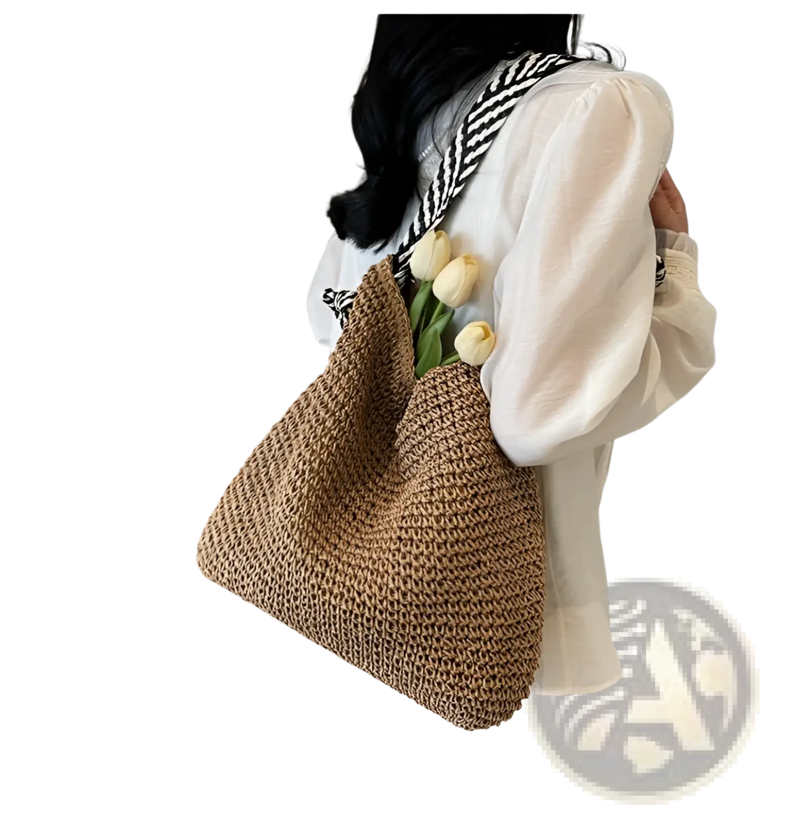 Beige woven straw tote bag with black and white striped shoulder strap featuring bow handles