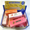 Colorful fruit-themed strawberry butter slow rising squishy toy stress relievers in a box for tactile use
