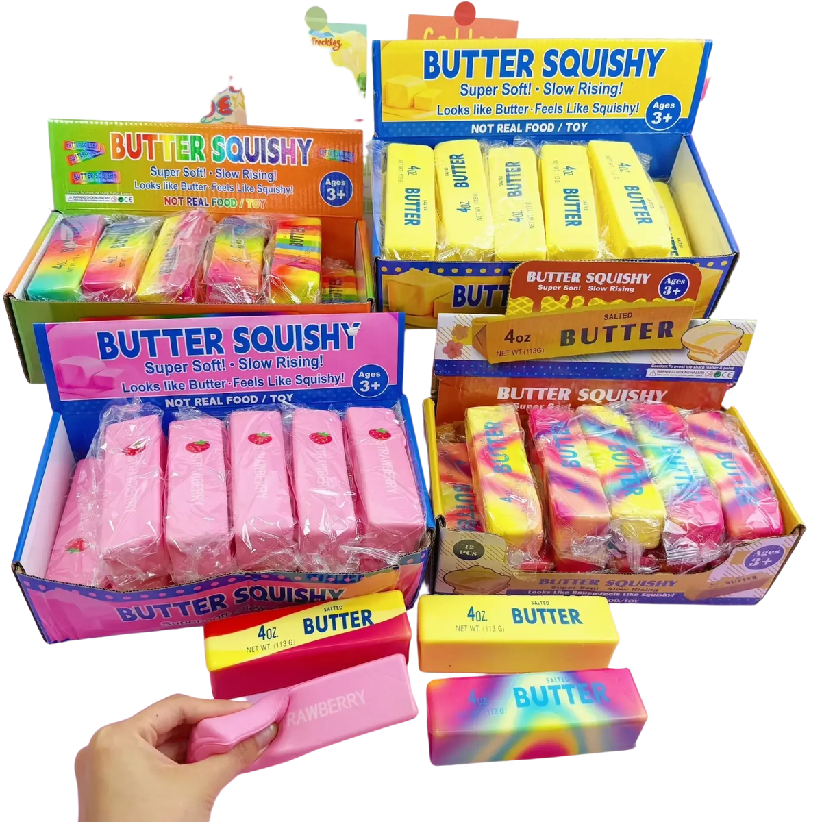 Pink butter-shaped slow rising squishy toy with strawberry design packaged in clear plastic for stress relief