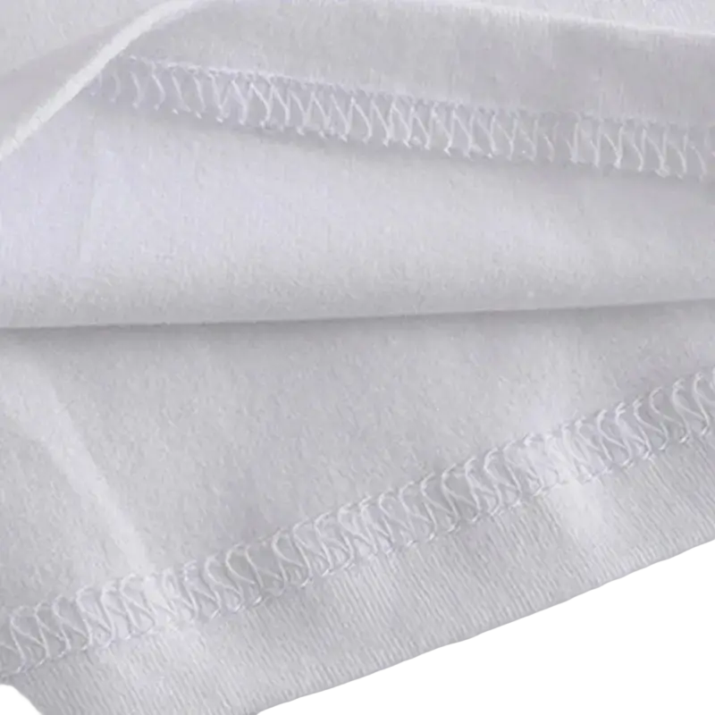 White cotton fabric with neat zigzag stitching on the edges of a strawberry print short sleeve casual t-shirt