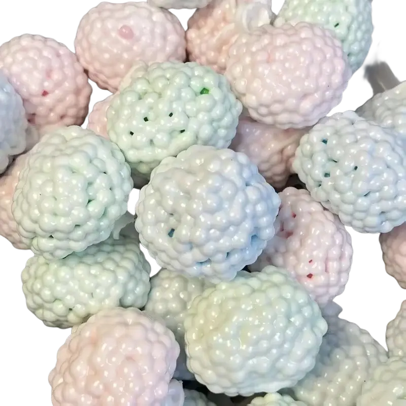 Pastel-colored stress ball fidget toy with bumpy texture in soft pink and mint green for asmr crunchy sensory play