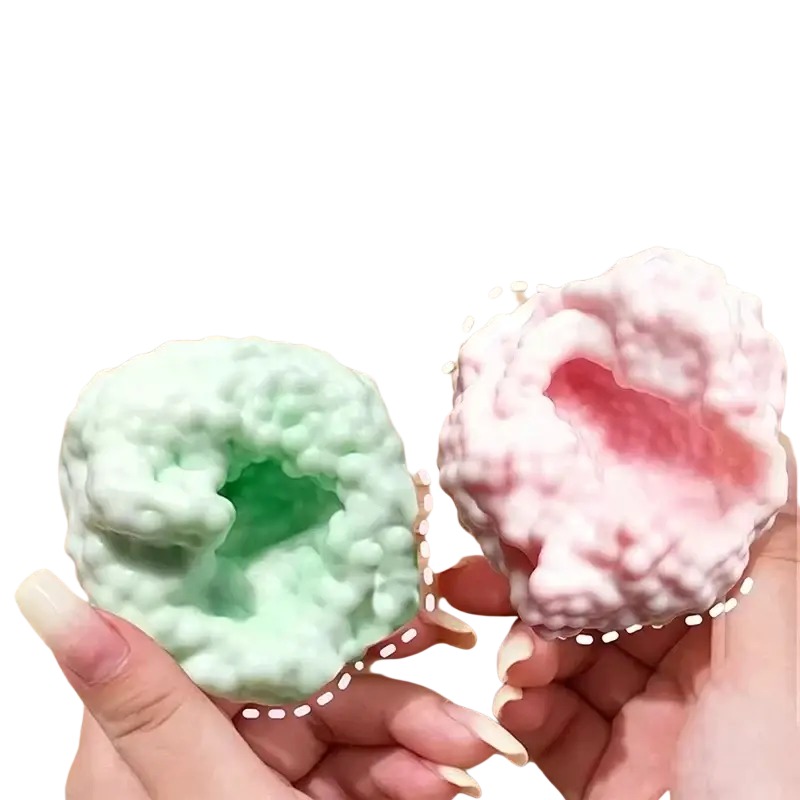 Pastel green and pink cloud-shaped stress balls with textured squishy surfaces for asmr crunchy fidget toy use
