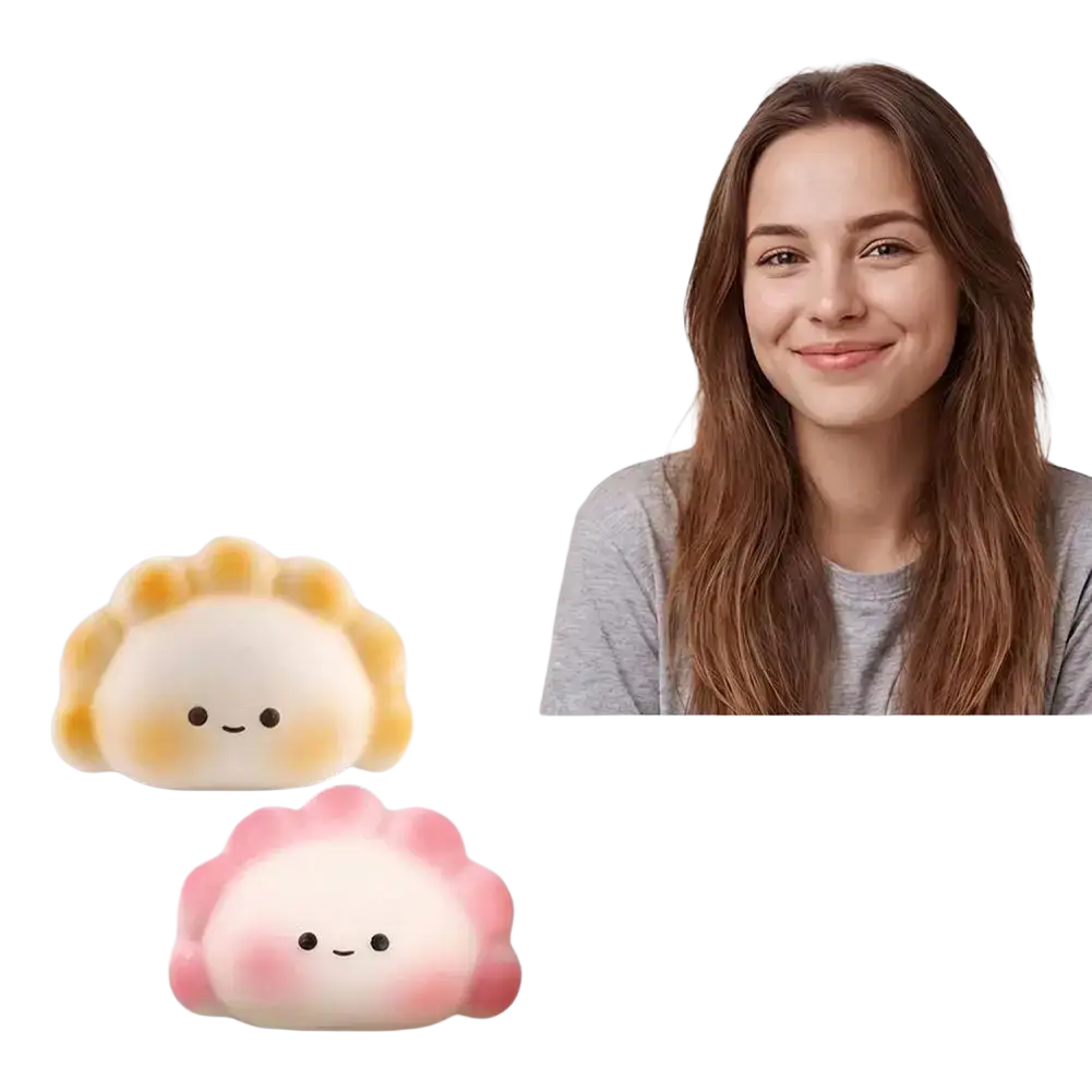 Cute stress-relieving toy dumpling squishies in soft white and pink silicone with cheerful facial expressions