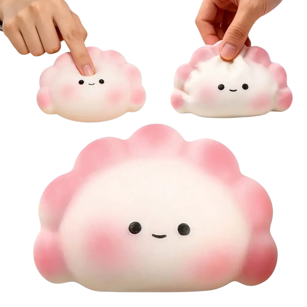 Pink and white dumpling-shaped stress-relieving toy squishy with a cute smiling face for anxiety relief