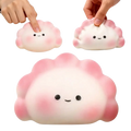 Pink and white dumpling-shaped stress-relieving toy squishy with a cute smiling face for anxiety relief