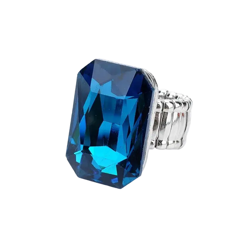 Stretch crystal statement ring for women featuring a blue rectangular crystal with a silver-toned ribbed adjustable band