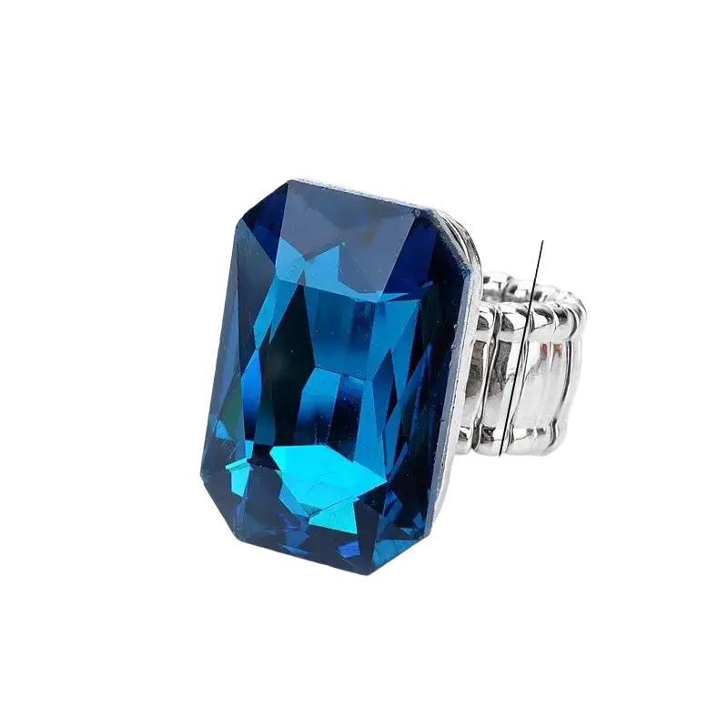 A striking royal blue rectangular crystal stretch statement ring for women with a silver-toned textured band