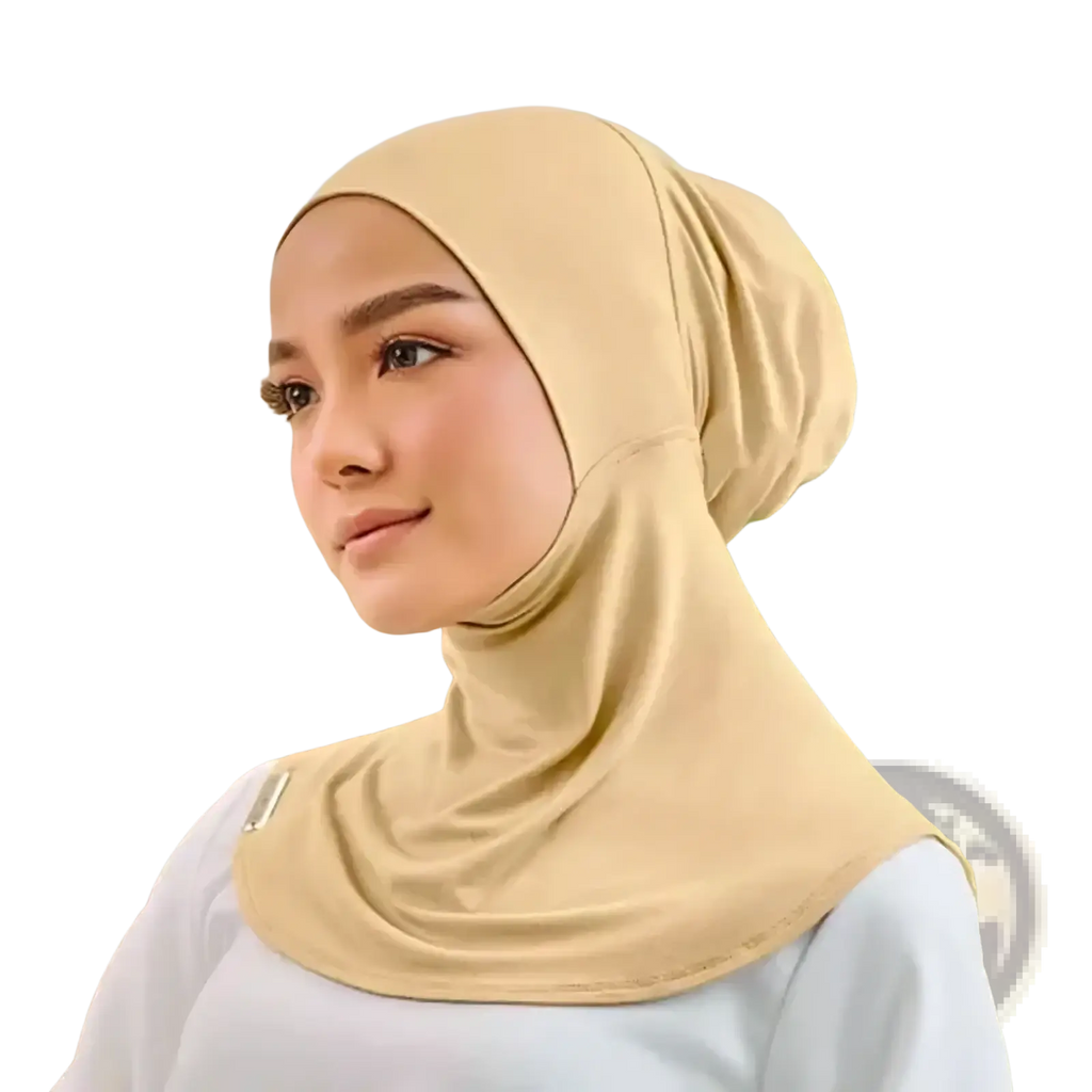 Beige stretch hijab cap under scarf with soft texture and subtle metallic accent on the shoulder