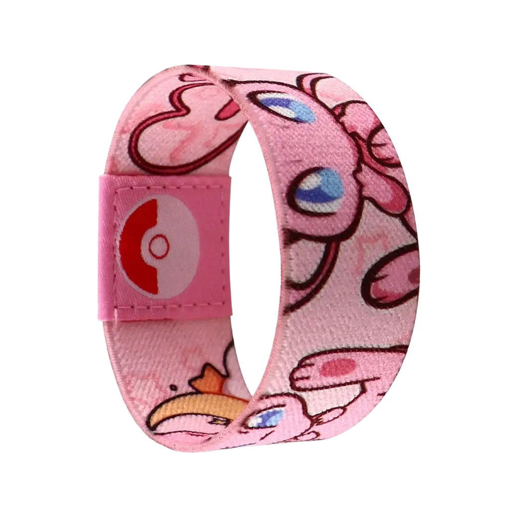 Pink stretch wristband bracelet featuring jigglypuff cartoon design with blue eyes and poké ball logo on adjustable fabric strap