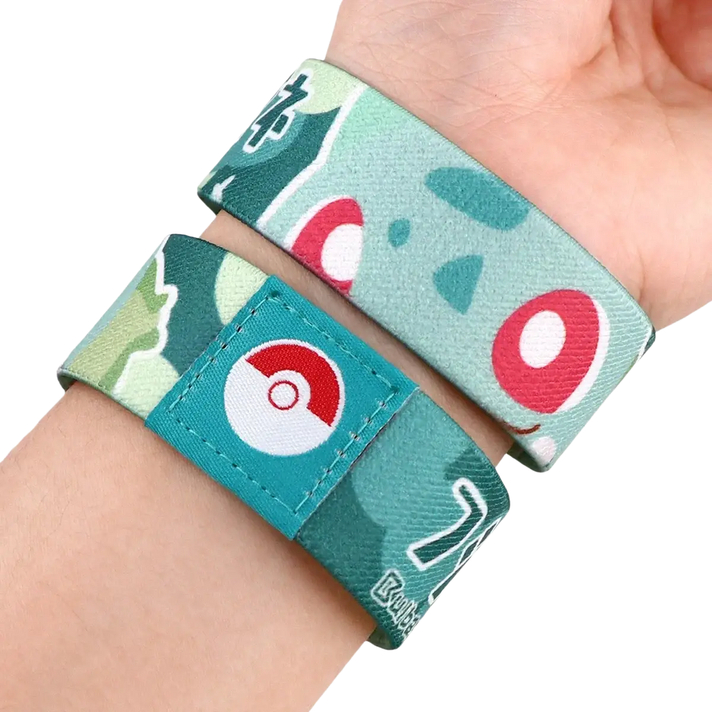 Teal and green baskerville-themed stretch wristband bracelet with cartoon pokémon face and white stitched poké ball patch