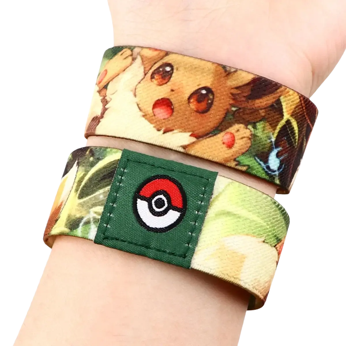 A vibrant elastic stretch wristband bracelet with pokemon eevee print and a green embroidered poké ball patch
