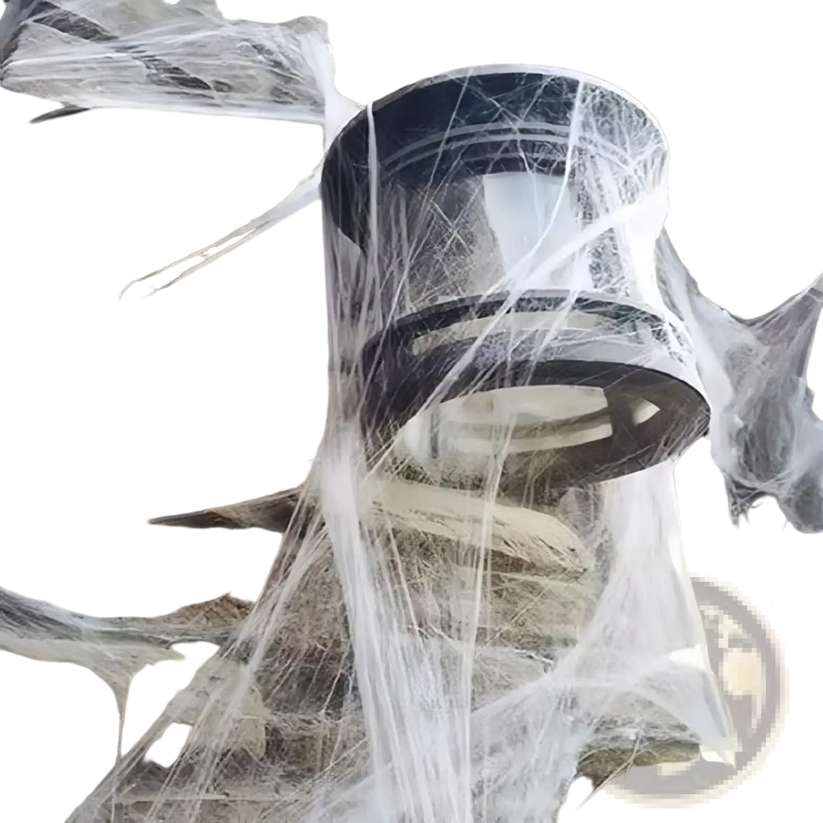 Black cylindrical outdoor lantern covered in white stretchable halloween spider web decoration for spooky decor