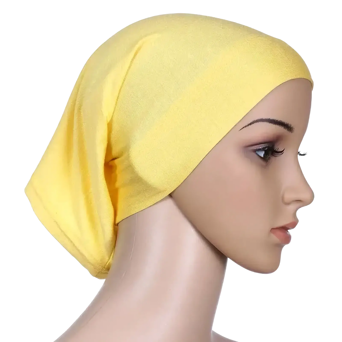 A soft solid yellow stretchy hijab underscarf cap made of smooth fabric drapes gently on a mannequin’s head