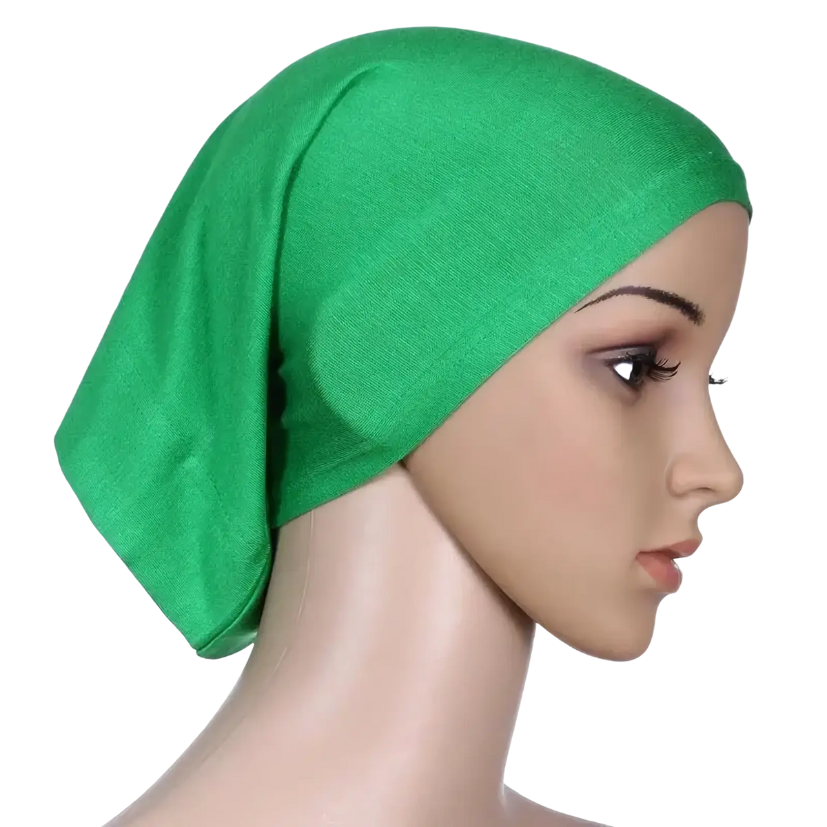 A vibrant green soft-textured stretchy hijab underscarf cap worn snugly on a mannequin’s head for women