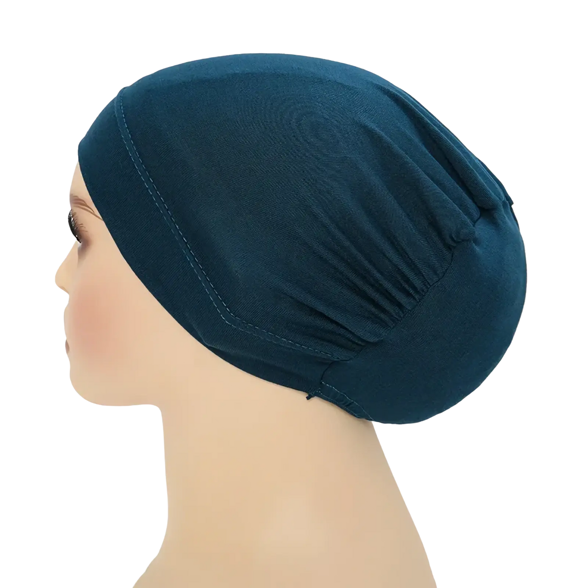 A soft dark teal stretchy jersey sleep cap with subtle stitching details from the stretchy jersey hijab cap and turban set