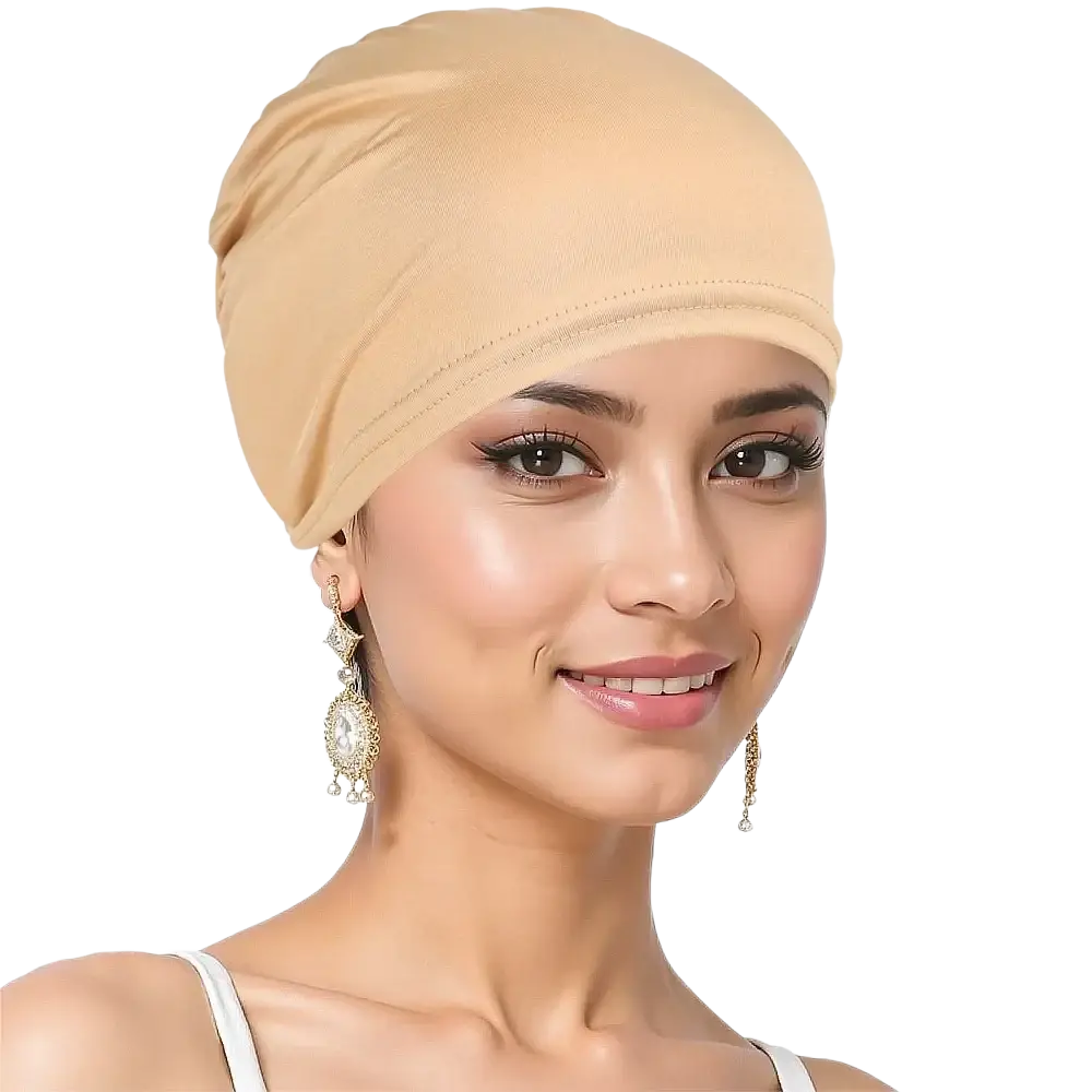 Beige stretchy jersey turban chemo hijab hat worn snugly to cover the hair made of soft fabric