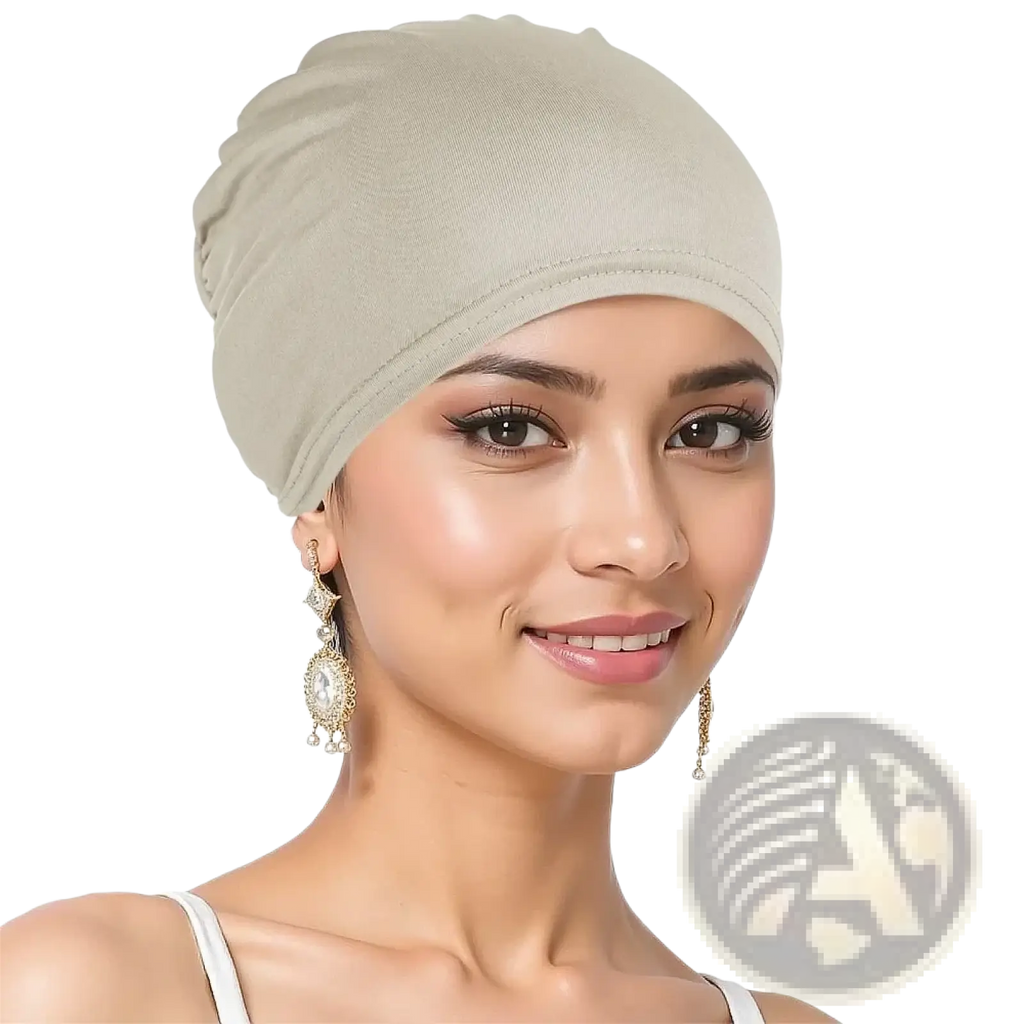 Beige stretchy jersey turban chemo hijab hat worn snugly on the head made of soft breathable fabric