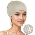 Beige stretchy jersey turban chemo hijab hat worn snugly on the head made of soft breathable fabric