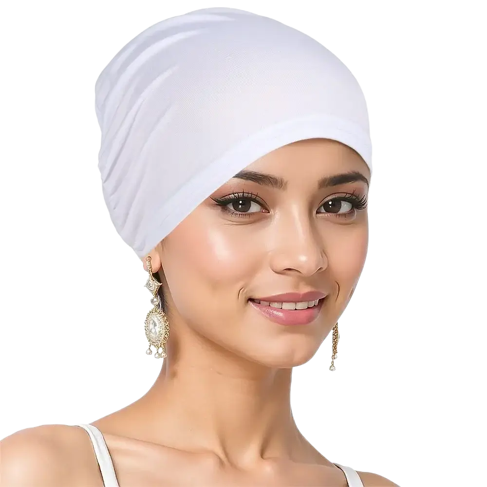 White soft-textured stretchy jersey turban chemo hijab hat worn in a turban style