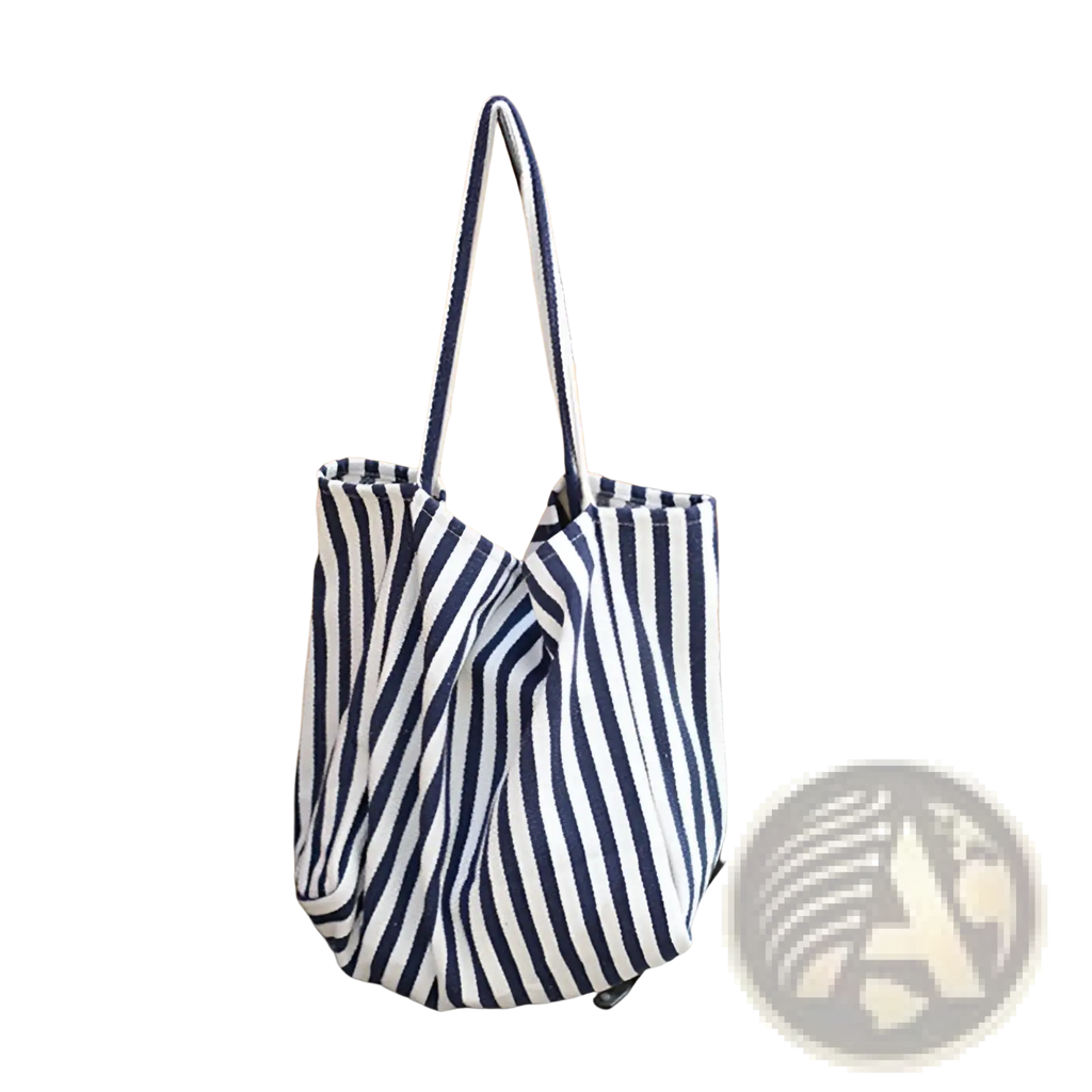 A navy and white vertically striped canvas tote bag with high capacity and sturdy shoulder handles