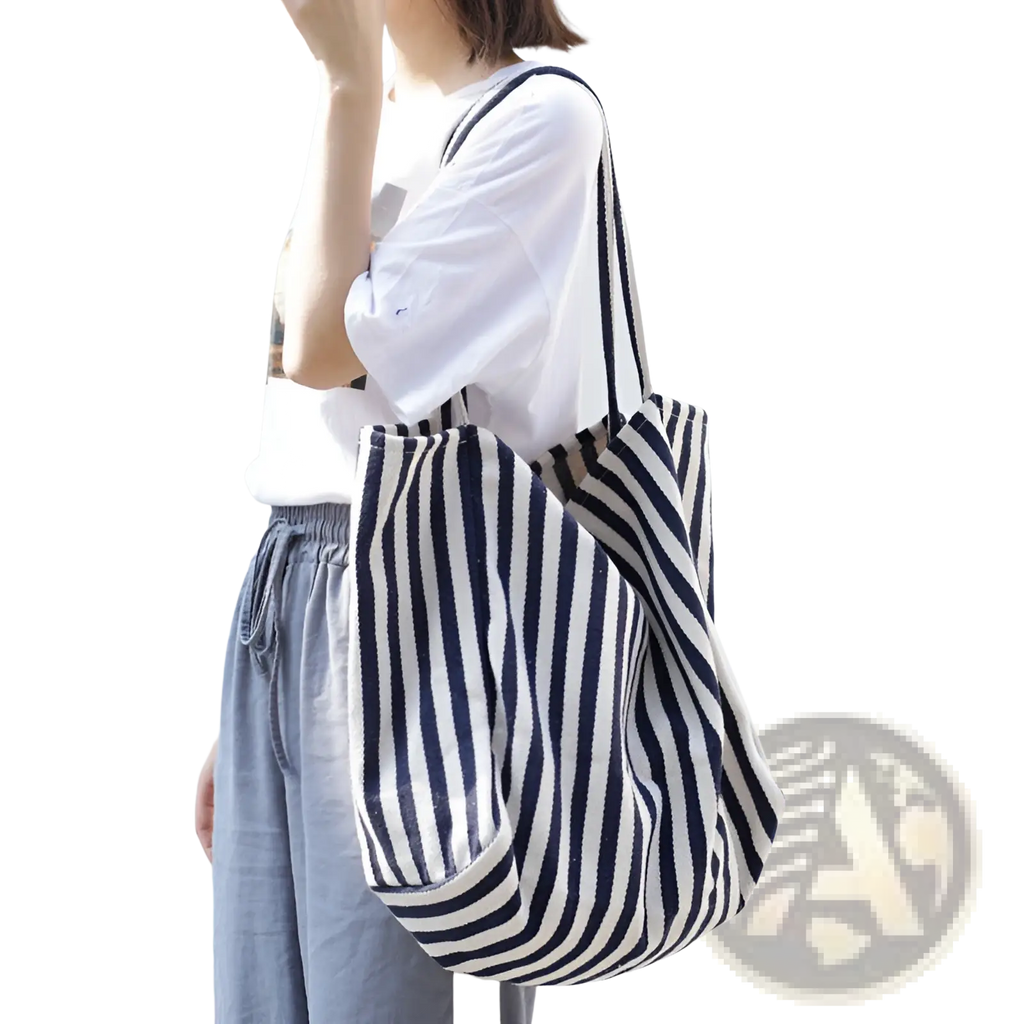Striped canvas tote bag with navy and white vertical stripes high capacity relaxed shoulder bag design