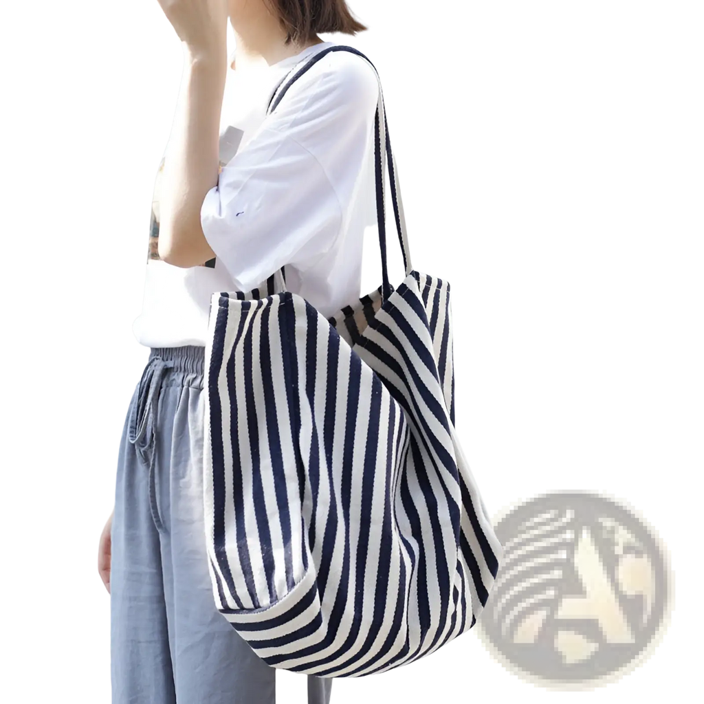 Navy and white vertically striped canvas tote bag with a gathered slouchy design high capacity shoulder bag
