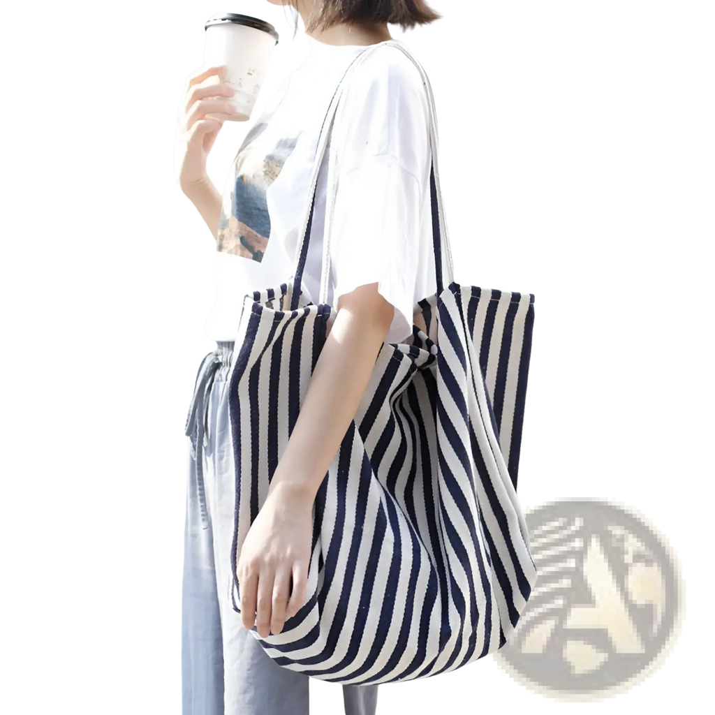 Navy and white striped canvas tote bag with high capacity and shoulder straps for casual use