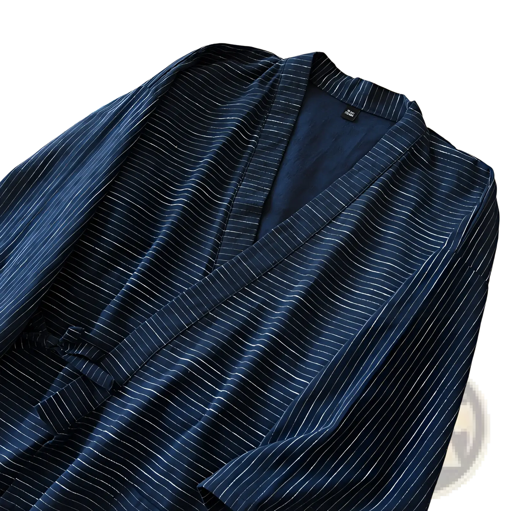 A navy blue striped cotton kimono pajama set for men with fine white pinstripes and lightweight fabric