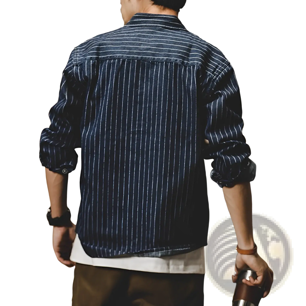 Navy blue and white vertically striped cotton denim shirt for men with long sleeves rolled up in a loose fit