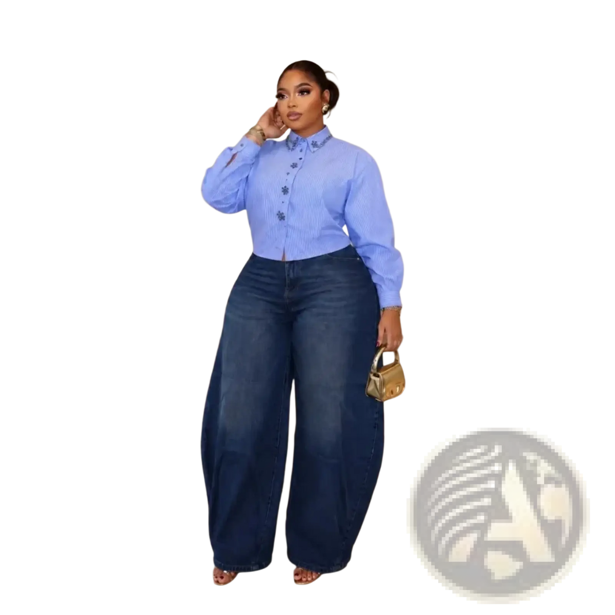 A woman wearing a light blue striped floral embroidered vintage blouse with dark wash wide-leg denim pants