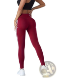 Maroon high waist yoga leggings with white side stripes designed for comfort and performance during workouts