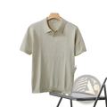 Light green striped jacquard ribbed knit polo shirt with classic collar and short sleeves hanging on wooden hanger