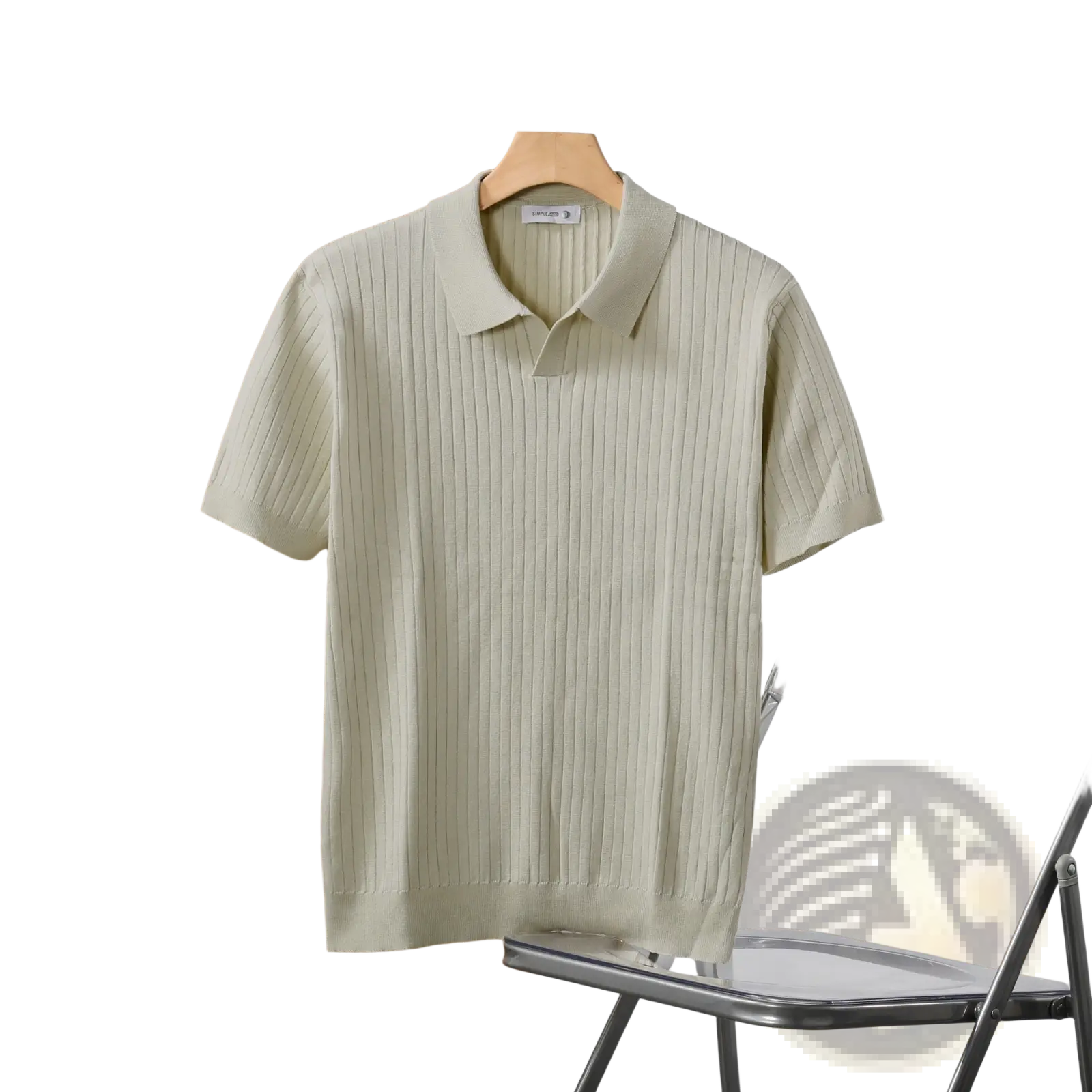 Light green striped jacquard ribbed knit polo shirt with classic collar and short sleeves hanging on wooden hanger
