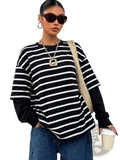 Black and white striped mock two piece oversized hoodie with layered look and long sleeves in soft cotton blend