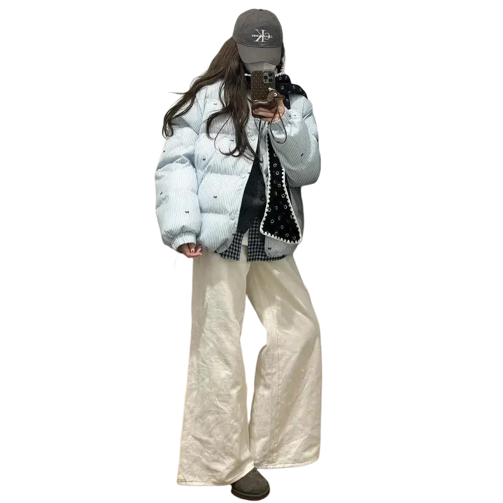 Light blue striped puffer jacket winter coat with vertical stripes and small black embellishments for cold weather