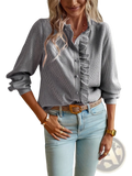 A stylish gray and white vertically striped textured blouse with ruffled detailing along the front placket