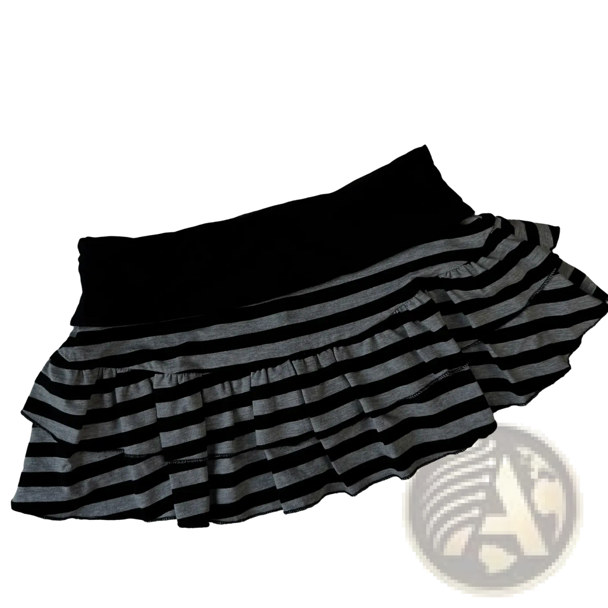 Striped ruffled mini skirt featuring black and gray stripes with a solid black elastic waistband