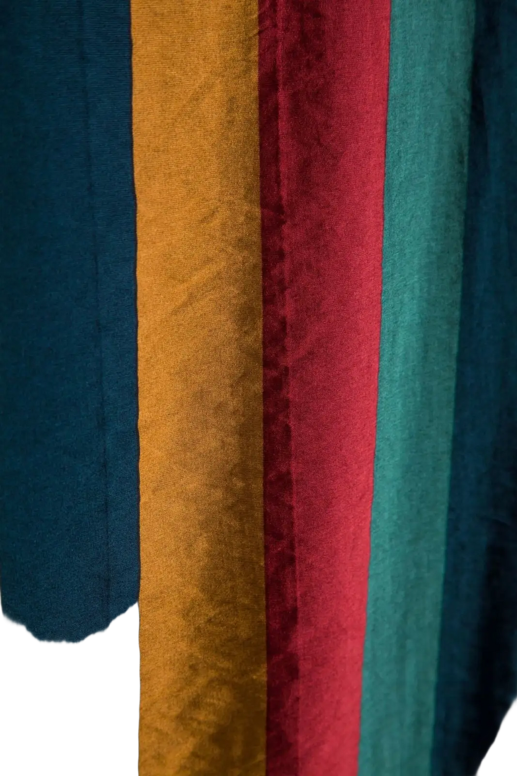 Striped short sleeve button up shirt with vibrant teal mustard yellow deep red and navy blue textured fabric panels
