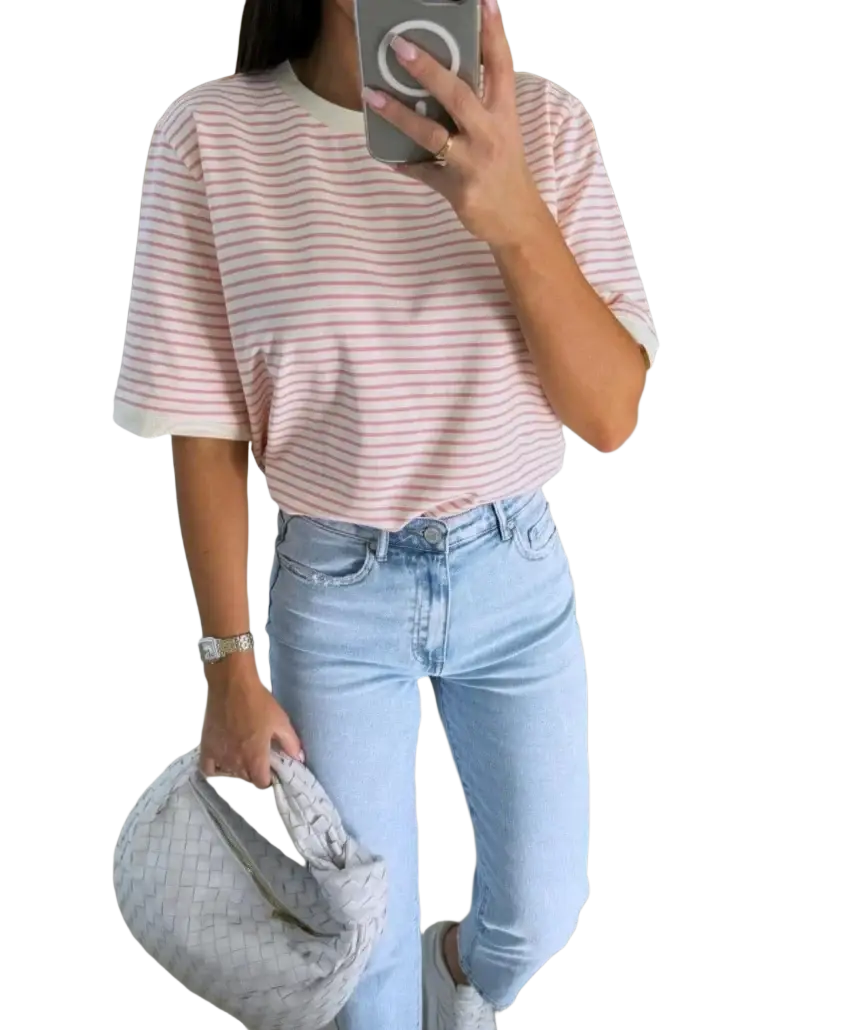 Light gray woven handbag with textured interlaced pattern paired with striped short sleeve t shirt casual summer top