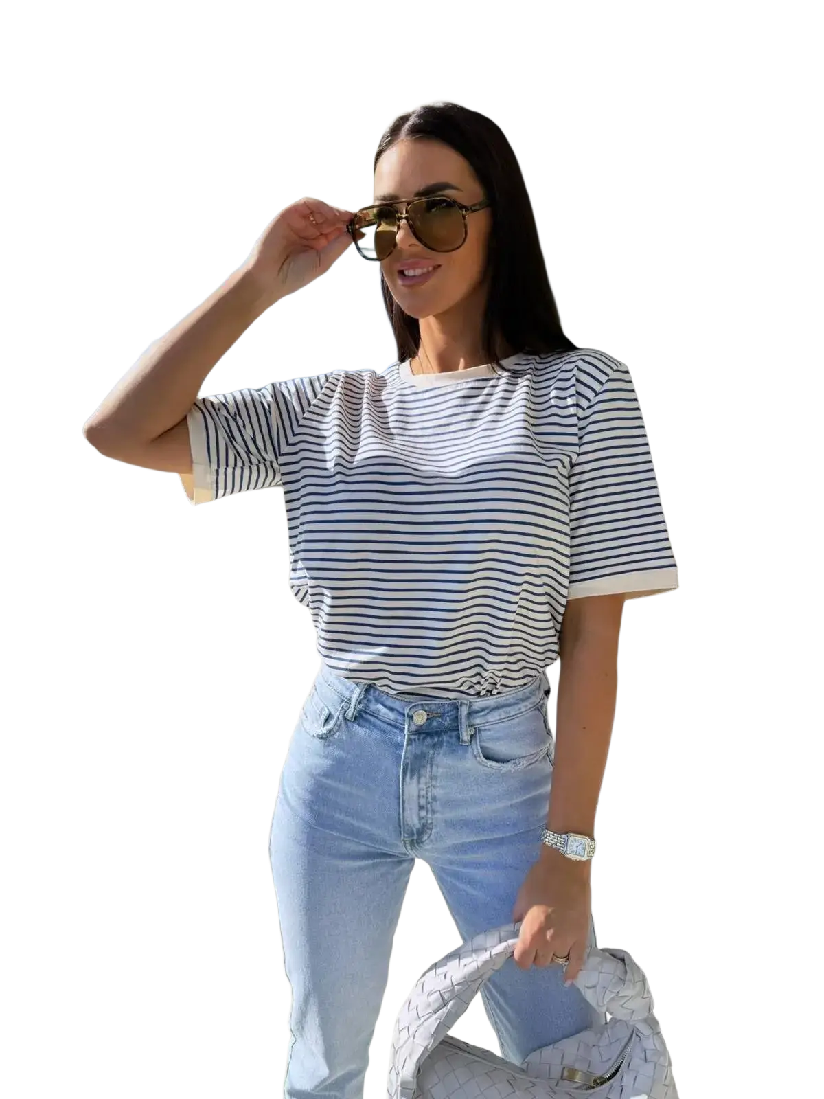 A woman wearing a navy and white striped short sleeve casual summer t shirt with rolled up sleeves