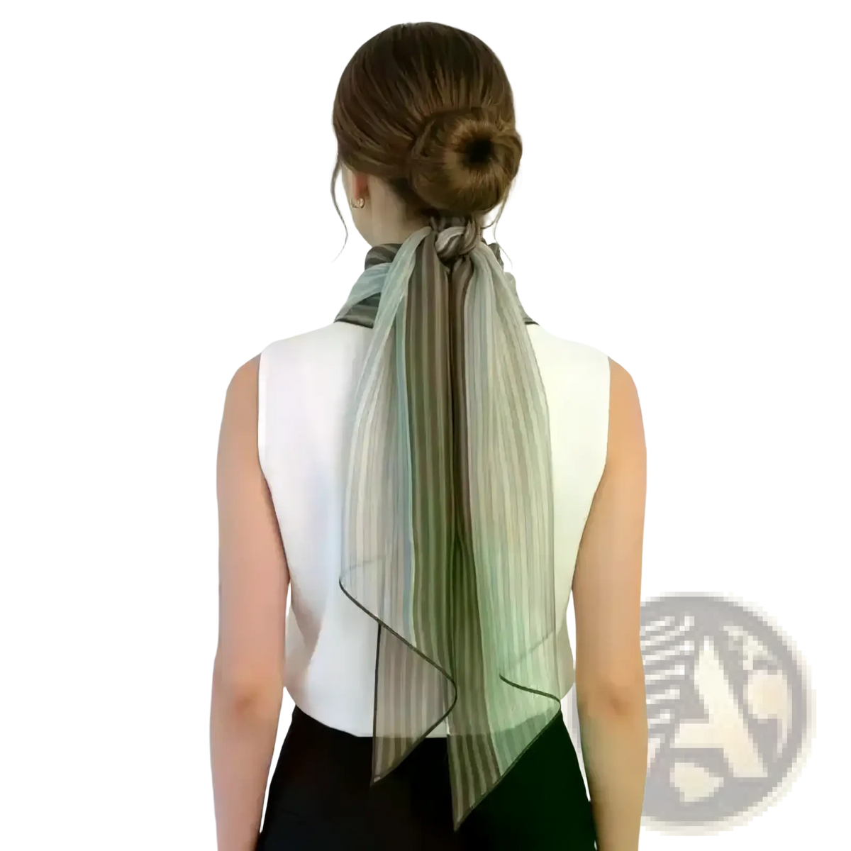 A sheer striped silk neck scarf in muted green and gray with black trim tied at the back of a woman’s neck