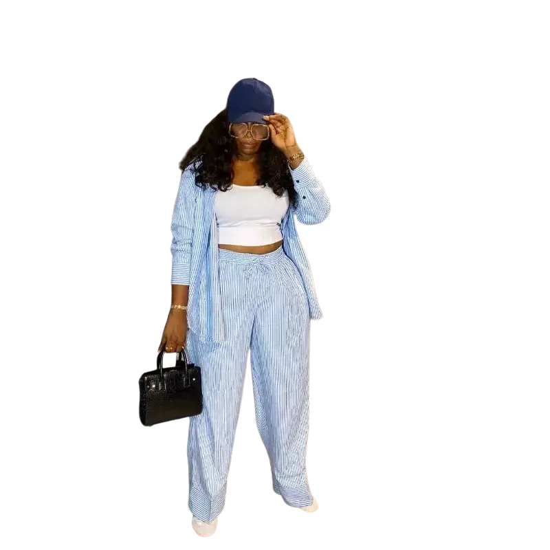 Blue and white vertically striped two piece matching set with button closure and a cropped jacket