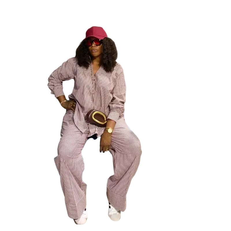 Pink and white vertically striped two piece matching set with button closure and wide-leg pants