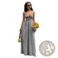Black and white vertically striped maxi dress with halter neckline, deep front cutout, and fitted waistband for summer wear