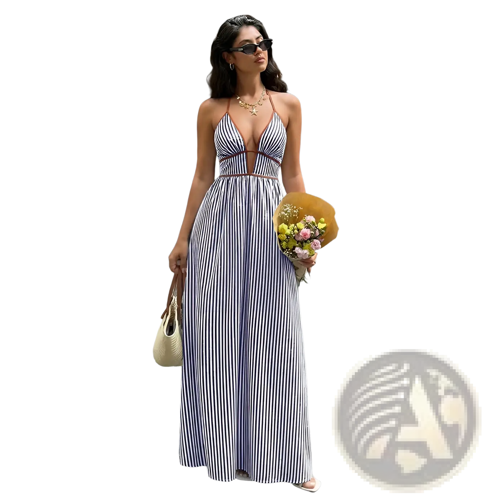 A woman wearing a long flowing navy and white striped v neck tie back summer maxi dress showing the back side