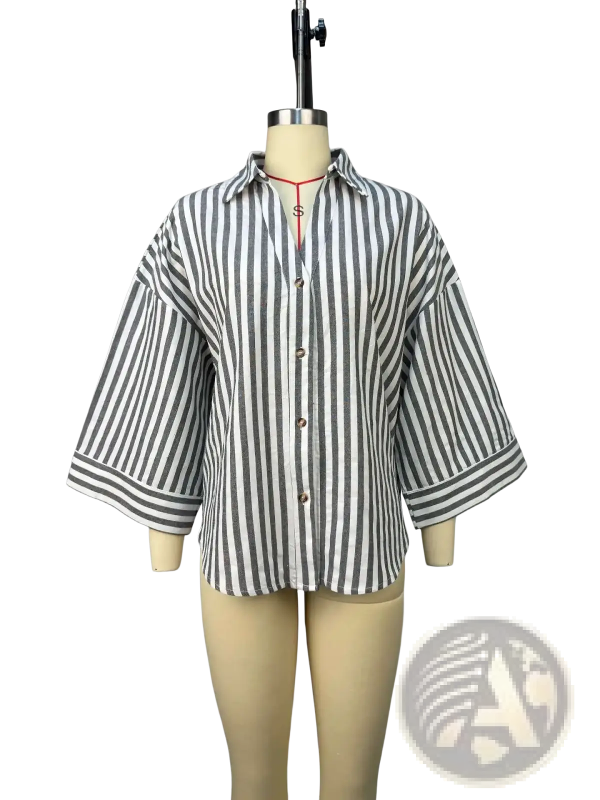 Striped Y2k button up blouse in black and white vertical stripes with three quarter sleeves on mannequin