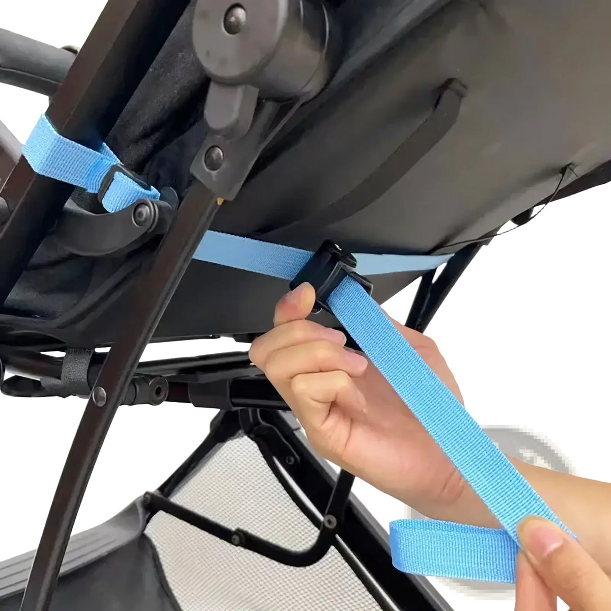 Light blue stroller backrest adjustment strap with black plastic buckle attached to stroller frame